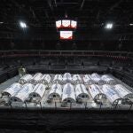 In this photo released by China's Xinhua News Agency, temporary laboratories for nucleic acid testing are seen in a sports stadium in Nanjing in eastern China's Jiangsu Province, Tuesday, July 27, 2021. Drivers seeking to leave eastern China's Jiangsu province will have to show a negative COVID-19 test taken in the last 48 hours or be forced to turn around, as cases in the province continue to rise. (Li Bo/Xinhua via AP)