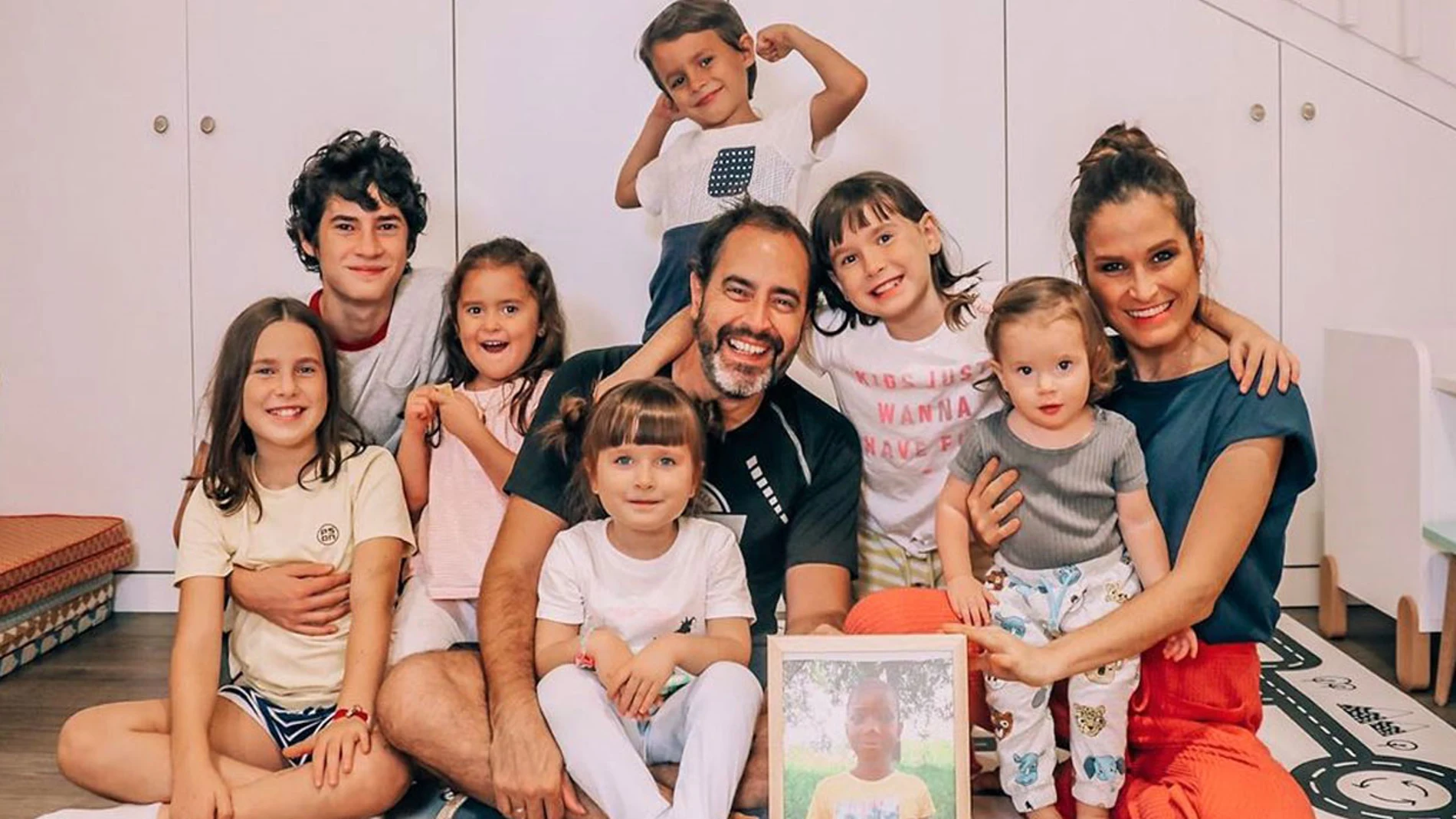 Verdeliss, su marido y sus siete hijos.