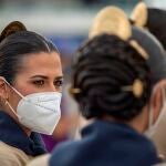 Un fallera con mascarilla