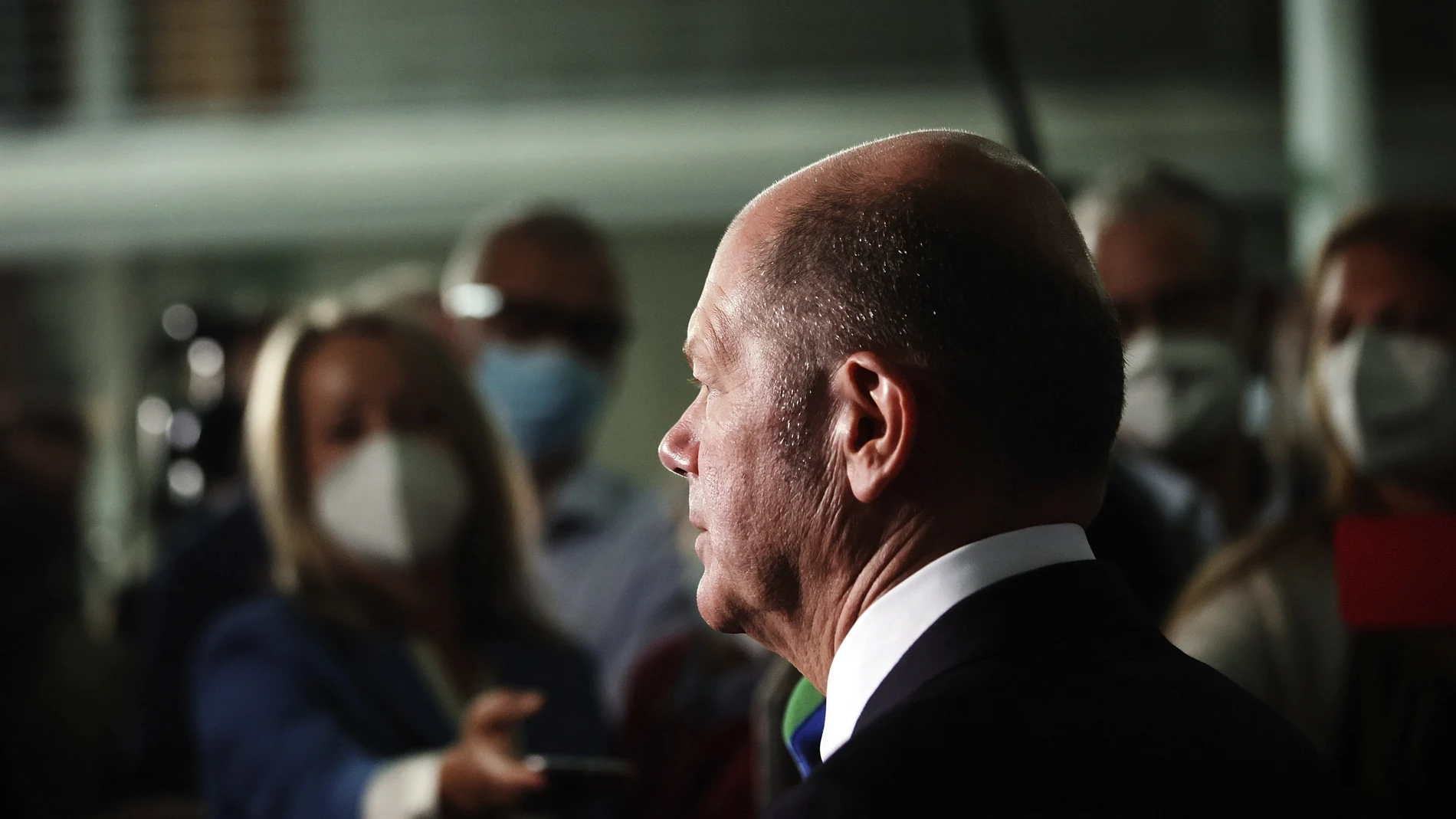 Olaf Scholz, Federal Minister of Finance, and SPD top candidate for chancellor at the forthcoming elections, speaks to journalists after the hearing before the Bundestag Finance Committee in Berlin, Germany, Monday, Sept. 20, 2021. Scholz was to answer questions about the search of his ministry in connection with money laundering investigations. (Carsten Koall/dpa via AP)