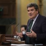 El ministro de Inclusión, Seguridad Social y Migraciones, José Luis Escrivá, en una sesión plenaria de la Cámara Baja, a 30 de septiembre de 2021, en Madrid (España)