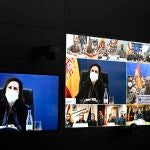 La ministra de Defensa, Margarita Robles, felicita por videoconferencia a los militares desplegados en el exterior, con motivo del Día de la Fiesta Nacional