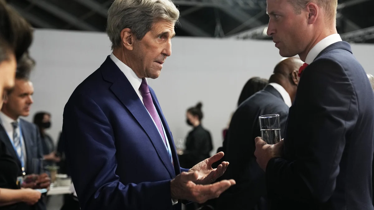 Britain's Prince William, right, speaks with John Kerry, United States Special Presidential Envoy for Climate, during a meeting with Earthshot prize winners and heads of state on the sidelines of the COP26 U.N. Climate Summit in Glasgow, Scotland, Tuesday, Nov. 2, 2021. The U.N. climate summit in Glasgow gathers leaders from around the world, in Scotland's biggest city, to lay out their vision for addressing the common challenge of global warming. (AP Photo/Alastair Grant, Pool)