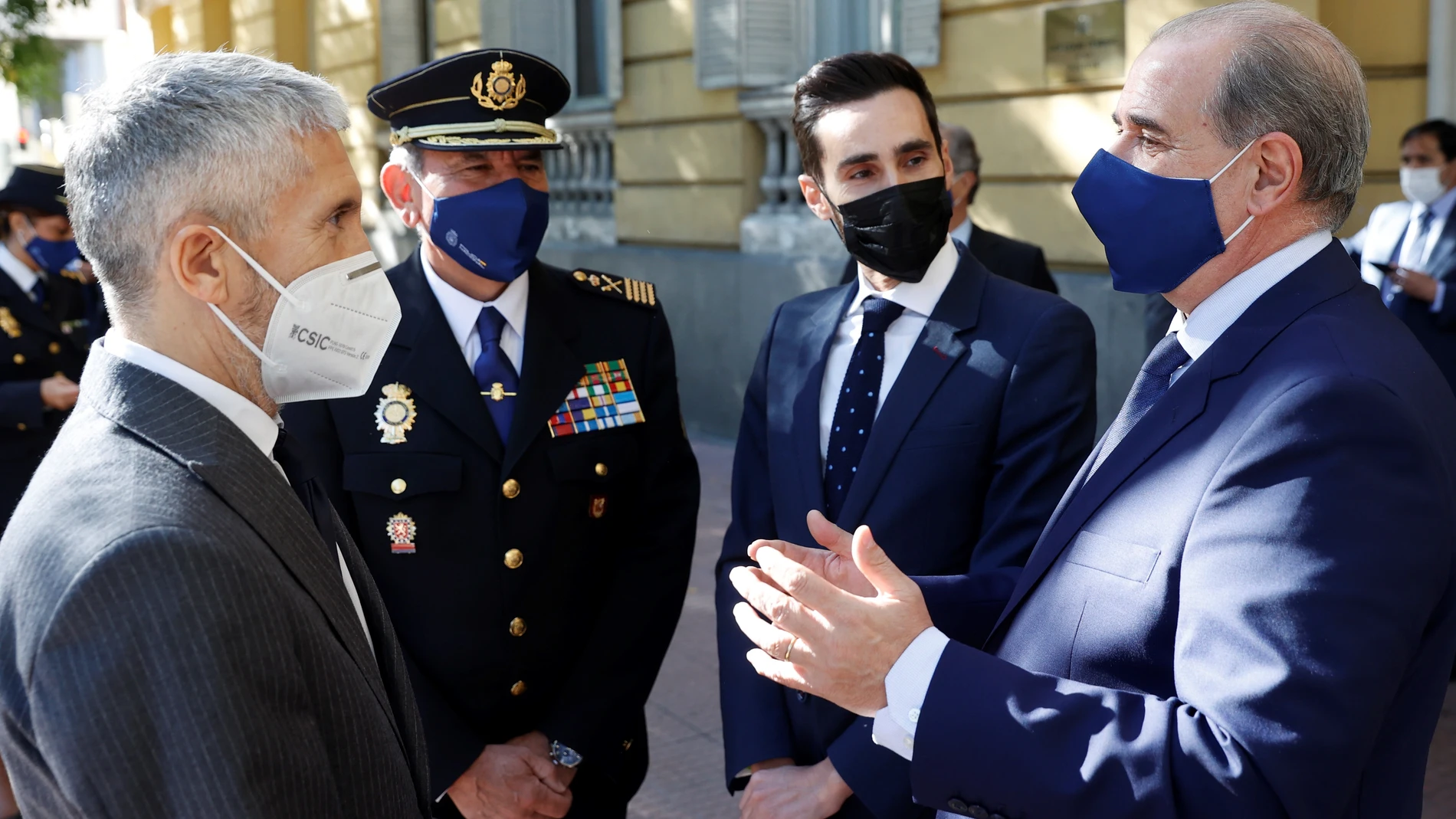 Fernando Grande-Marlaska, con el director operativo de la Policía Nacional, José Ángel González; el secretario de Estado de Seguridad, Rafael Pérez, y el director general de la Policía Nacional, Francisco Pardo