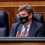 El ministro de Inclusión, Seguridad Social y Migraciones, José Luis Escrivá, en la sesión plenaria en el Congreso de los Diputados