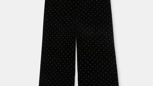 Pantalón fluido de terciopelo con tachas, de Green Coast