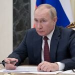 Russian President Vladimir Putin attends a cabinet meeting via a videoconference at the Kremlin in Moscow, Russia, Wednesday, Jan. 12, 2022. (Alexei Nikolsky, Sputnik, Kremlin Pool Photo via AP)