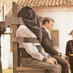 Captura de pantalla de la película "El huerto del francés", del año 1978, donde se ilustra la ejecución por garrote vil