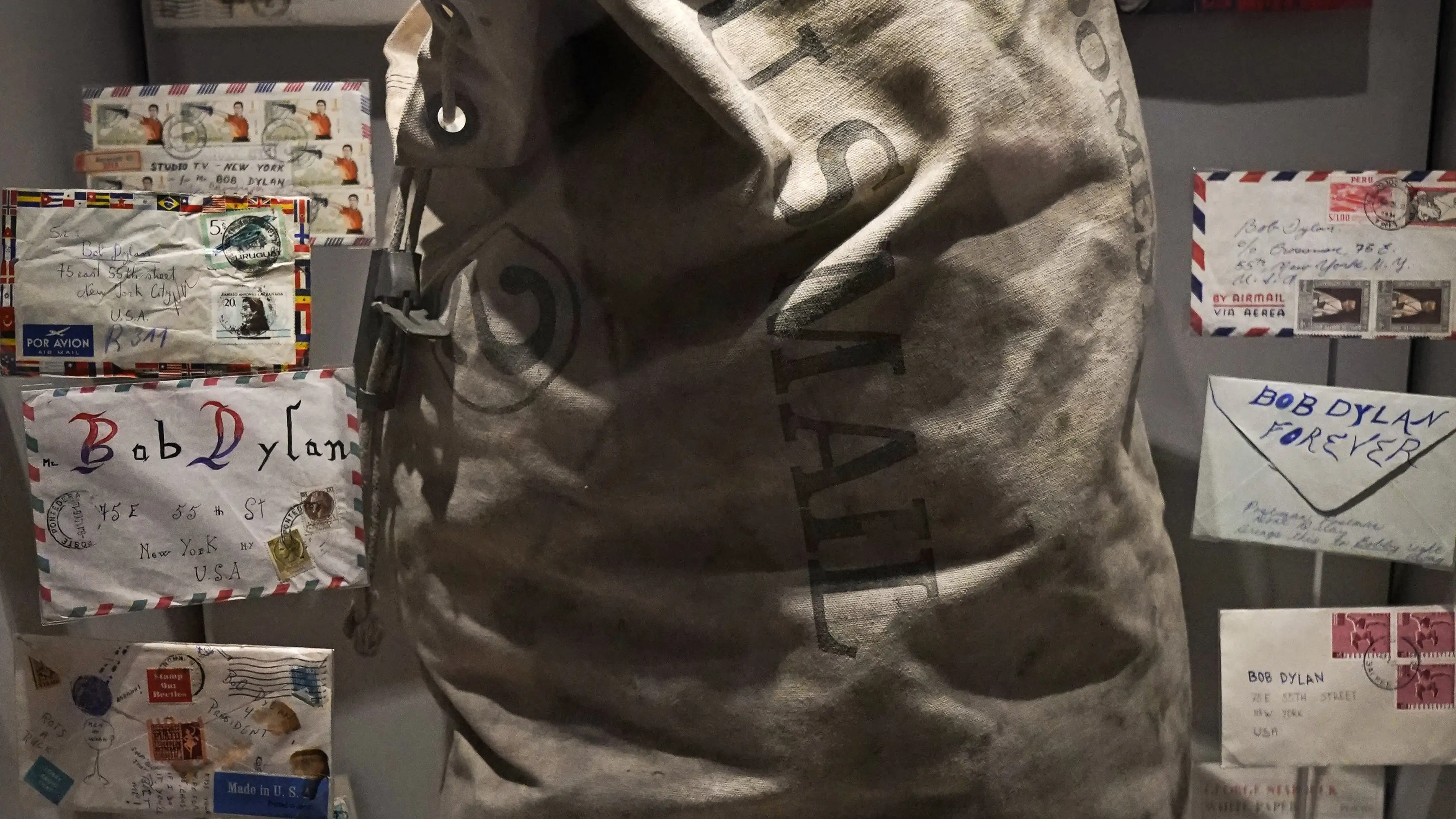 A mailbag with cards and letters from fans following Bob Dylan's 1966 motorcycle accident are pictured at the Bob Dylan Center Thursday, May 5, 2022, in Tulsa, Okla. The center offers an immersive film experience, performance space, a studio where visitors can play producer and &quot;mix&quot; different elements of instrumentation in Dylan's songs and a curated tour where people can take a musical journey through the stages of his career. (AP Photo/Sue Ogrocki)