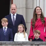 FILE - Britain's Prince William, Kate, Duchess of Cambridge, Prince George, Princess Charlotte and Prince Louis, appear on the balcony of Buckingham Palace, during the Platinum Jubilee Pageant outside Buckingham Palace in London, June 5, 2022. Prince William and his wife, Kate, will relocate their family from central London to more rural dwellings in Windsor, and all three of their children will attend the same private school near their new home, palace officials said Monday Aug. 22, 2022. (Chris Jackson/PA via AP, File)