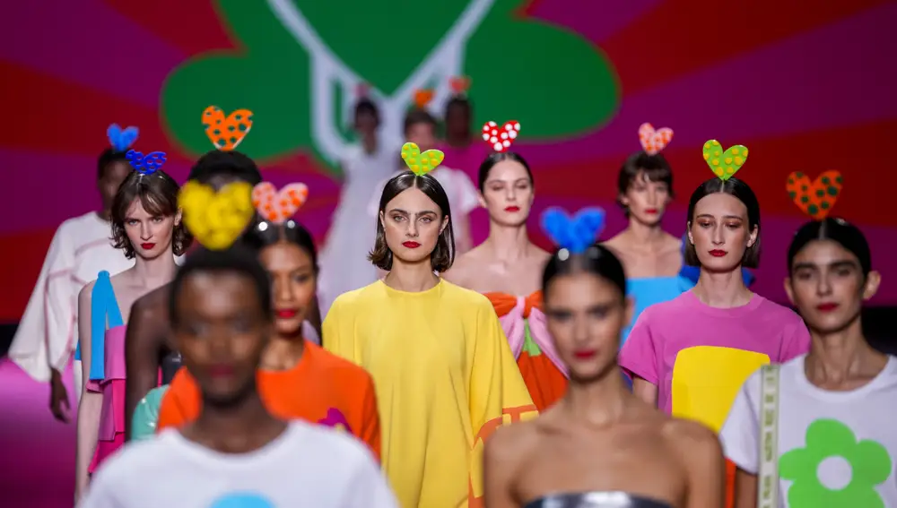 Models wear creations by Agatha Ruiz de la Prada during Fashion Week in Madrid, Spain, Friday, Sept. 16, 2022. (AP Photo/Manu Fernandez)