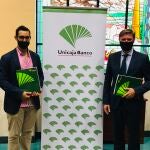 Firma renovación acuerdo Unicaja Banco y ACIA