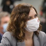 La presidenta de la Comunidad de Madrid, Isabel Díaz Ayuso, durante una visita a la sede de Servinform