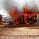 Imagen de archivo de la destrucción de una aldea cristiana