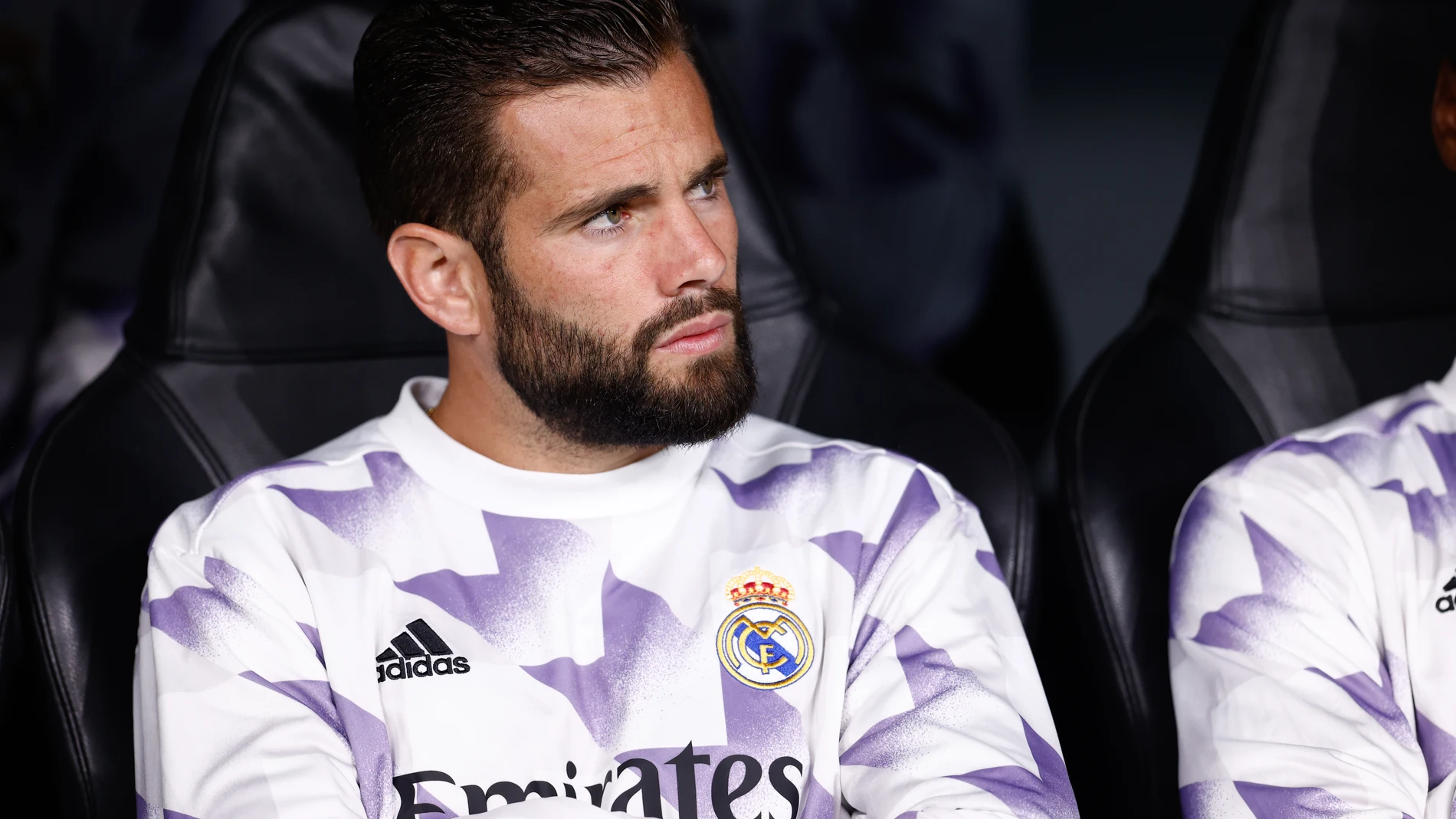 Nacho Fernández en el banquillo del Real Madrid.