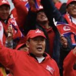 Los actores animando a Corea del Norte
