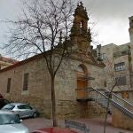 Lateral de la iglesia vieja del barrio de Pizarrales, en cuyo descampado se ha producido el suceso