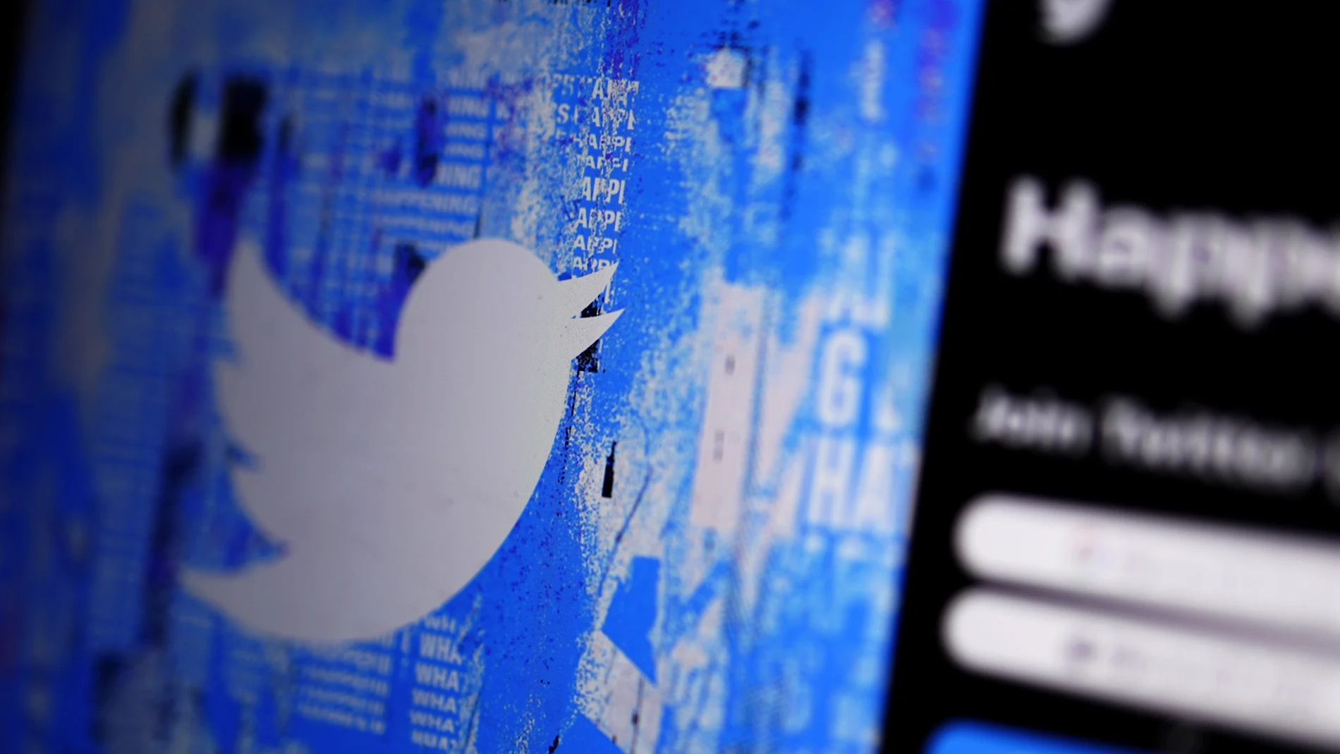FILE - The Twitter splash page is seen on a digital device, on April 25, 2022, in San Diego. Elon Musk said Friday Nov. 25, 2022 that Twitter plans to relaunch its premium service that will offer different colored check marks to accounts next week, in a fresh move to revamp the service after a previous attempt backfired. (AP Photo/Gregory Bull, File)