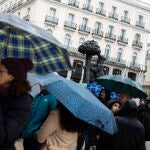 Día de lluvia y paraguas en Madrid 