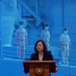 Taipei (Taiwan), 27/12/2022.- Taiwan President Tsai Ing-wen speaks in front of a screen showing defense forces, during a press conference in Taipei, Taiwan, 27 December 2022. Tsai addresses national security issues including the recent Chinese military incursion above Taiwan airspace on 26 December. EFE/EPA/RITCHIE B. TONGO