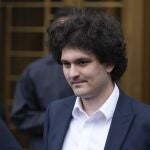 Samuel Bankman-Fried leaves Manhattan federal court in New York, Tuesday, Jan. 3, 2023. Bankman-Fried pleaded not guilty to charges that he cheated investors and looted customer deposits on his cryptocurrency trading platform as a judge set a tentative trial date for October. (AP Photo/Seth Wenig)