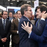 El líder del PP, Alberto Núñez Feijóo y el presidente de la Junta de Castilla y León, Alfonso Fernández Mañueco se saludan durante una visita a la tercera jornada de la Feria Internacional de Turismo, Fitur 2023, en IFEMA Madrid, a 20 de enero de 2023, en Madrid (España). Alberto Núñez Feijóo, ha visitado hoy la Feria Internacional de Turismo y ha recorrido los pabellones de varias comunidades autónomas, entre ellas, Andalucía, Galicia, Murcia, Ceuta, Madrid o Castilla y León. En estas dos últimas se ha encontrado con sus respectivos presidentes autonómicos, Isabel Díaz Ayuso y Alfonso Fernández Mañueco. El encuentro entre Feijóo y Mañueco ha sido el primero tras una semana de polémica por el protocolo antiaborto que anunció Vox en Castilla y León.20 ENERO 2023;FITUR;FERIA;TURISMO;INTERNACIONAL;PABELLONES;COMUNIDADES AUTÓNOMAS;PRESIDENTES;POLÉMICA;PROTOCOLO;ANTIABORTOGustavo Valiente / Europa Press20/01/2023