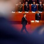 Chinese President Xi Jinping prepares to take his oath during the Third Plenary Session of the National People's Congress (NPC) at the Great Hall of the People, in Beijing, China, 10 March 2023. China holds two major annual political meetings, the National People's Congress (NPC) and the Chinese People's Political Consultative Conference (CPPCC) which run alongside and together are known as 'Lianghui' or 'Two Sessions'.