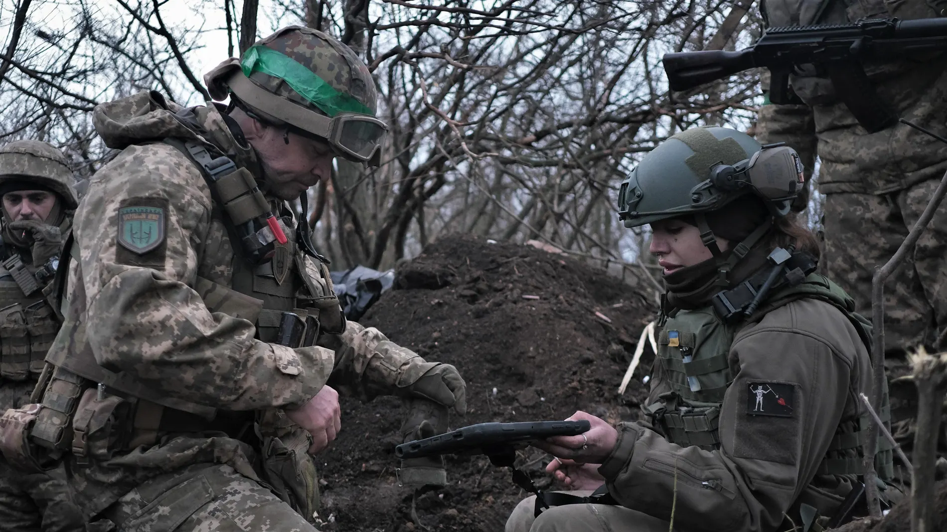 Soldiers of the Ukrainian Volunteer Army hold their positions at the front line near Bakhmut, Donetsk region, on March 11, 2023, amid the Russian invasion of Ukraine. (Photo by Sergey SHESTAK / AFP)