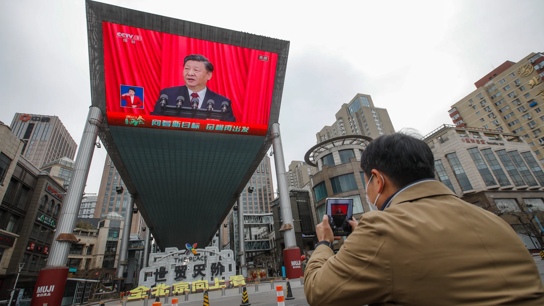 A screen shows Chinese President Xi Jinping during the Closing Session of the National People's Congress (NPC) at the Great Hall of the People, in Beijing, China, 13 March 2023. China holds two major annual political meetings, the National People's Congress (NPC) and the Chinese People's Political Consultative Conference (CPPCC) which run alongside and together are known as 'Lianghui' or 'Two Sessions'.