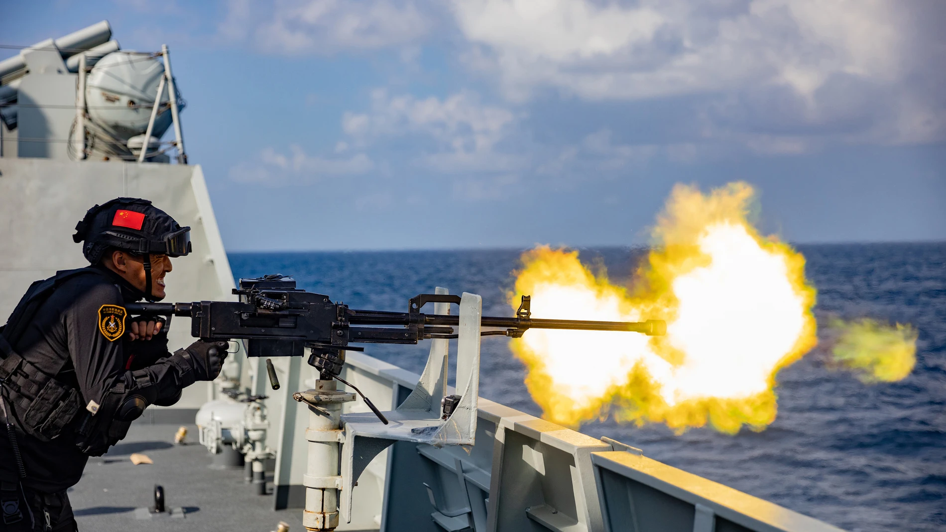 QINGDAO, March 31, 2023 -- A soldier shoots during an actual combat training of the 42nd fleet of the Chinese People's Liberation Army Navy, on Jan. 31, 2023. A Chinese naval fleet returned to east China's port city of Qingdao in Shandong Province on Thursday after completing its mission of escorting civilian vessels in the Gulf of Aden and in the waters off Somalia. 31/03/2023