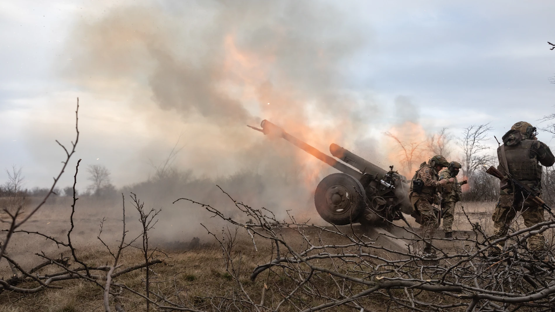 March 21, 2023, Bakhmut, Donetsk Region, Ukraine: Artillerymen from the 24th assault battalion ''Aidar'' shooting from 122 mm howitzer D-30 into Russian positions near Bakhmut, Donetsk region, Ukraine. Ukrainian forces heroically hold positions and attack the enemy near Bakhmut, Donetsk Region. Russian troops continue to storm Bakhmut - they have been unable to take the city since mid-summer 2022. 21/03/2023