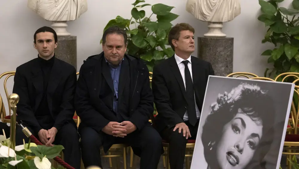 Late actress Gina Lollobrigida's nephew Dimitri Skofic, son Andrea Milko Skofic and ex-husband Francisco Javier Rigau attend a wake as Lollobrigida's coffin lies in state in the Aula Giulio Cesare on the Capitoline Hill (Campidoglio) in Rome, Italy