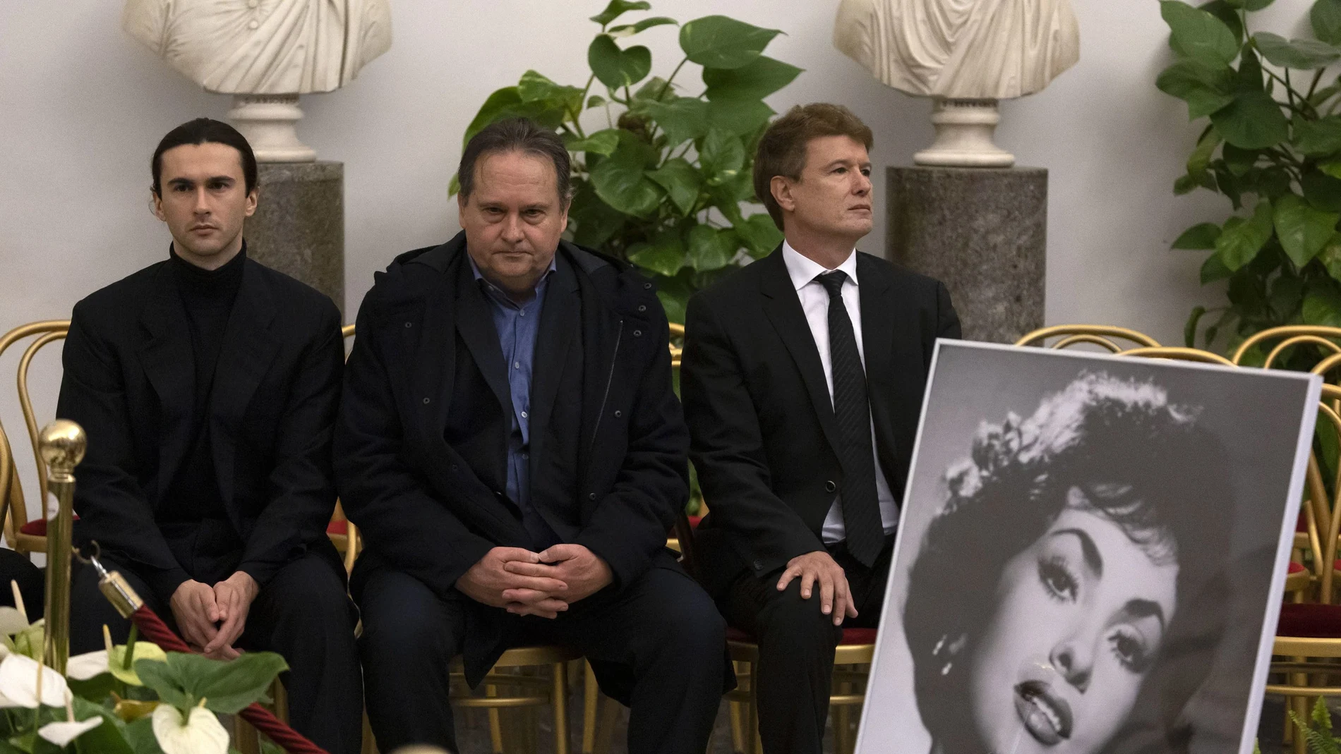 Late actress Gina Lollobrigida's nephew Dimitri Skofic, son Andrea Milko Skofic and ex-husband Francisco Javier Rigau attend a wake as Lollobrigida's coffin lies in state in the Aula Giulio Cesare on the Capitoline Hill (Campidoglio) in Rome, Italy