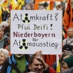 Activists take part in an event to celebrate the shut down of Germany's last nuclear power plants, in Munich, Germany.