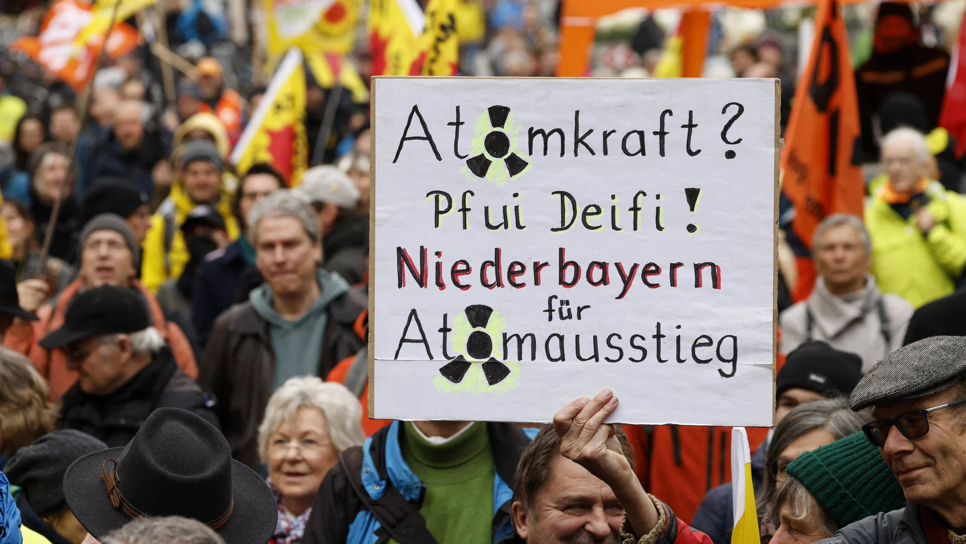 Activists take part in an event to celebrate the shut down of Germany's last nuclear power plants, in Munich, Germany.
