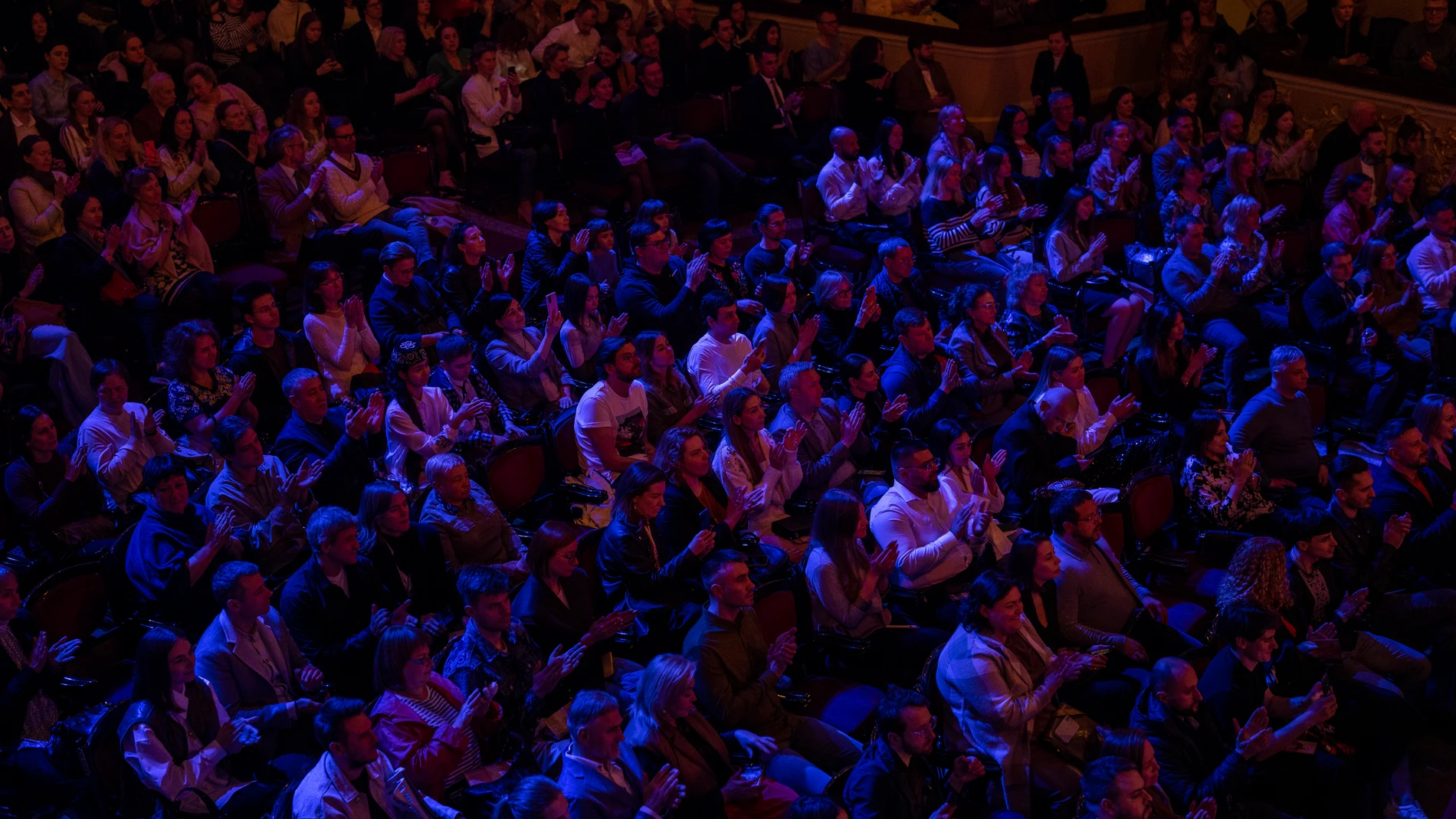 Spectators applaud during a concert of Ukrainian singer Jamala at the National Opera in central Kyiv on Friday, May 5, 2023. Jamala won the Eurovision Song Contest in 2016 with a song about the deportation of Crimean Tatars. Fast forward to this Eurovision week and she's launching a new album, filled with more stories about her ancestors. (AP Photo/Bernat Armangue)