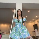 Rosalía con mini vestido de estilo oriental. 