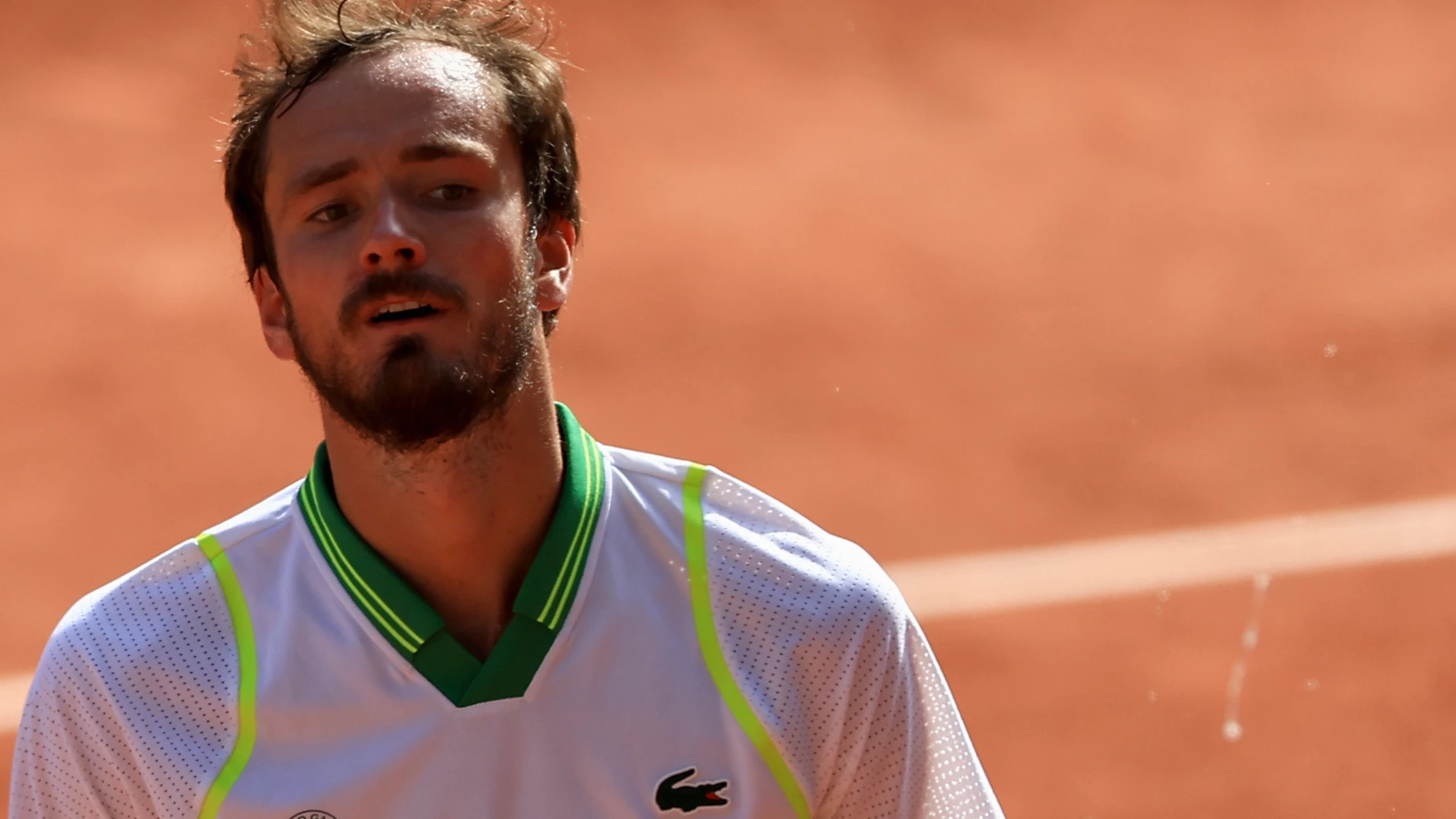 Russia's Daniil Medvedev spits as he walks off the court after losing against Brazil's Thiago Seyboth Wild during their first round match of the French Open tennis tournament at the Roland Garros stadium in Paris, Tuesday, May 30, 2023. (AP Photo/Aurelien Morissard)