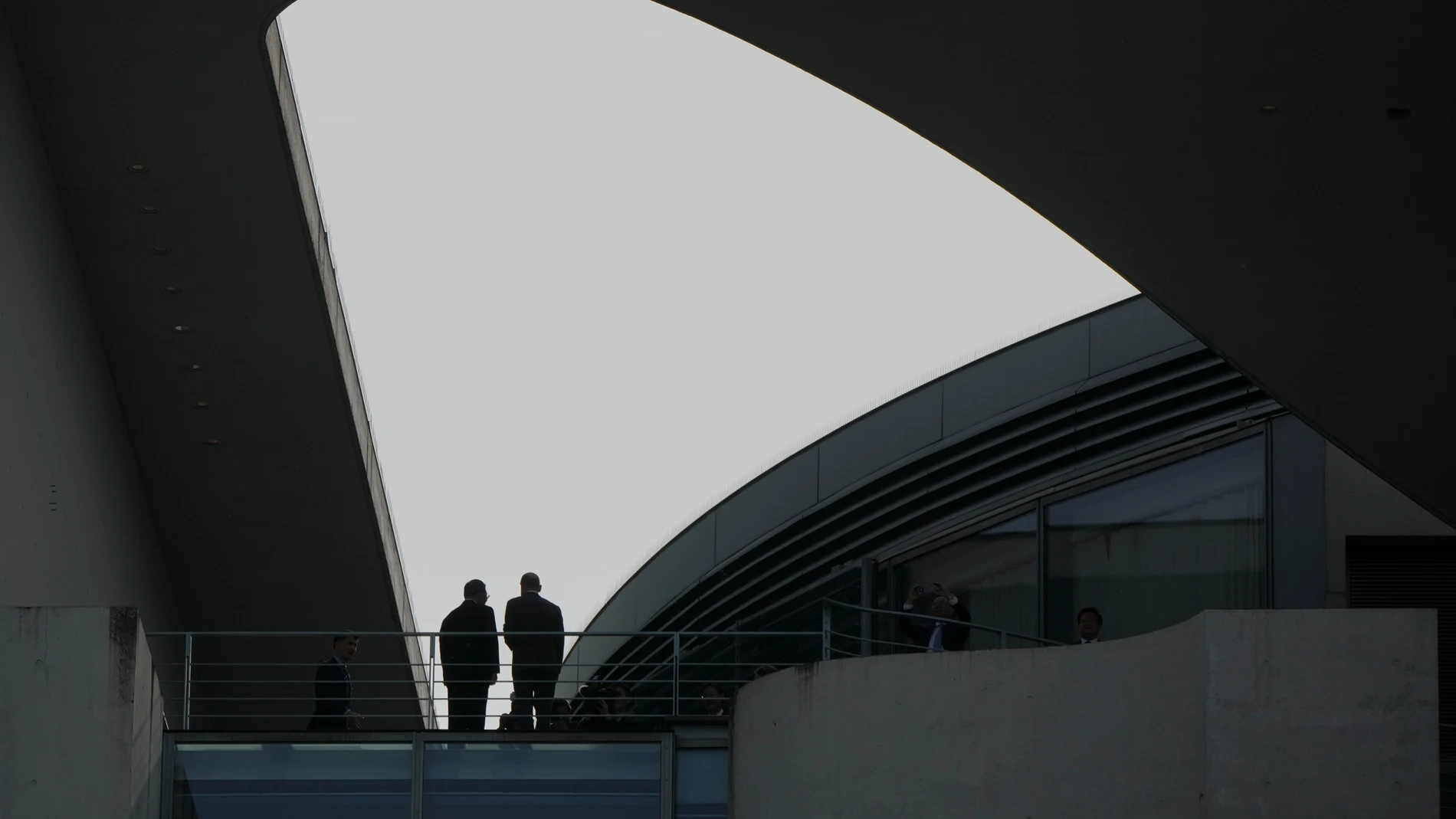 German Chancellor Olaf Scholz, right, talks with Chinese Premier Li Qiang on a balcony during a meeting at the Chancellery in Berlin, Germany, Monday, June 19, 2023. (AP Photo/Markus Schreiber)