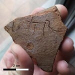 Inscripción localizada en el ánfora de aceite