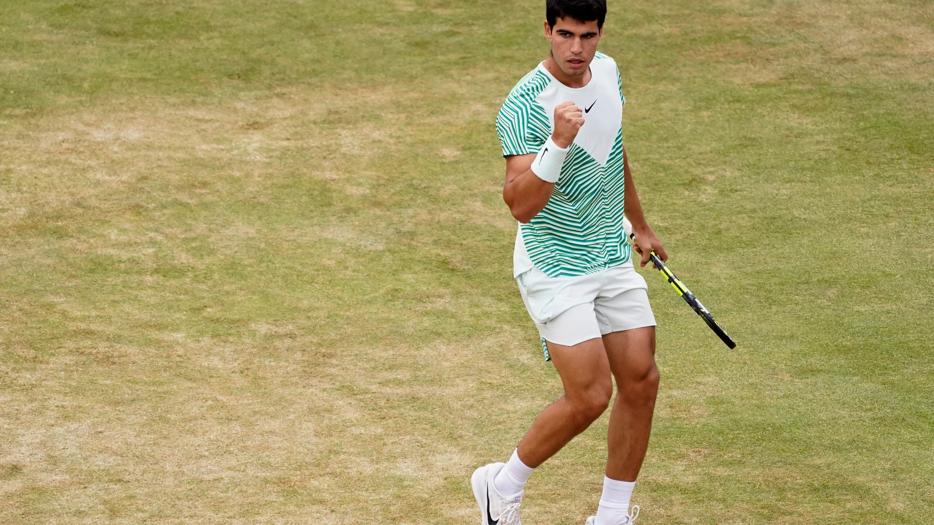 Carlos Alcaraz, of Spain, reacts after scoring a point against Sebastian Korda, of the US, during their mens singles semifinal match at the Queens Club tennis tournament in London, Saturday, June 24, 2023. (AP Photo/Alberto Pezzali)