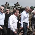 (L-R) NATO Secretary General Jens Stoltenberg, German Defence Minister Boris Pistorius and Lithuanian President Gitanas Nauseda visit the training phase of Exercise Griffin Storm at the General Silvestras Zukauskas Training Area, in Pabrade, Lithuania, 26 June 2023. 