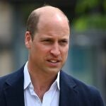 William, Prince of Wales departs a homeless centre in London