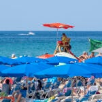 Primer día de julio en la playa de Benidorm