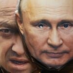ace masks depicting Russian President Vladimir Putin, right, and owner of private military company Wagner Group Yevgeny Prigozhin are displayed among others for sale at a souvenir shop in St. Petersburg, Russia.