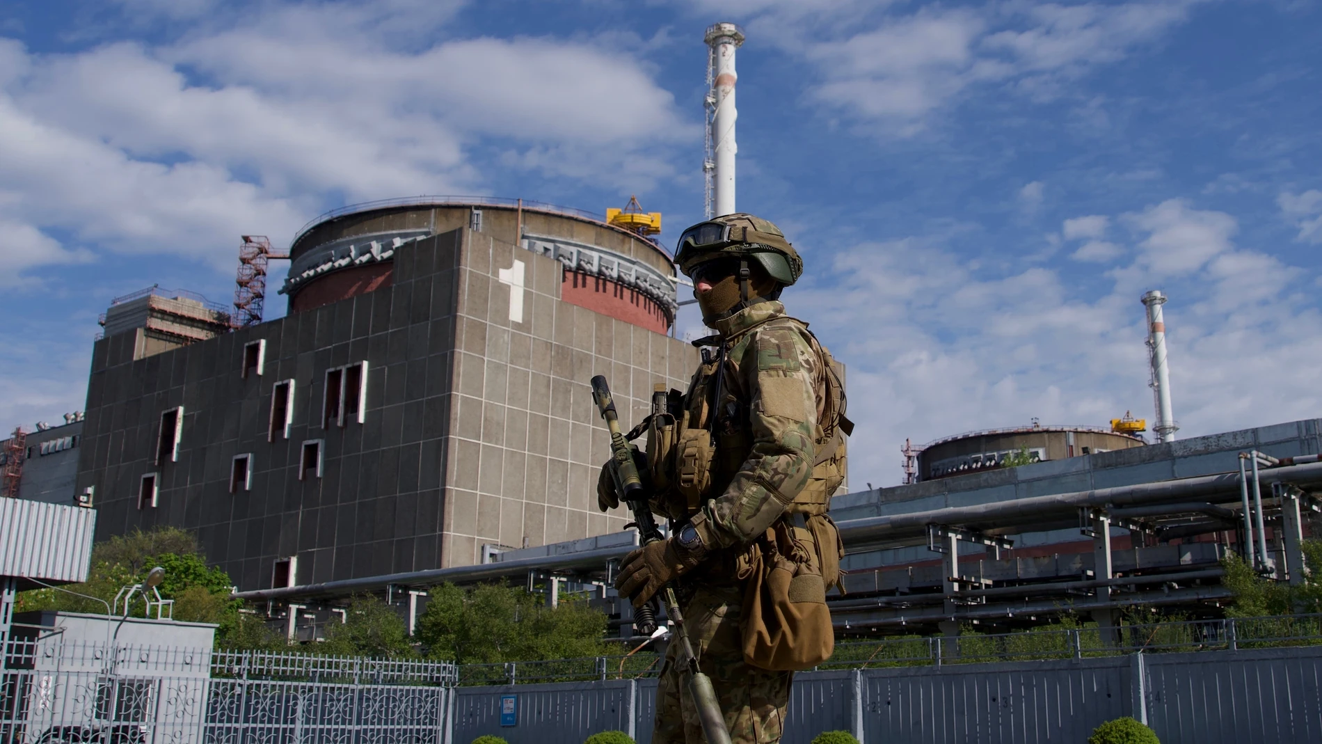 A Russian serviceman patrols the territory of the Zaporizhzhia Nuclear Power Station in Energodar