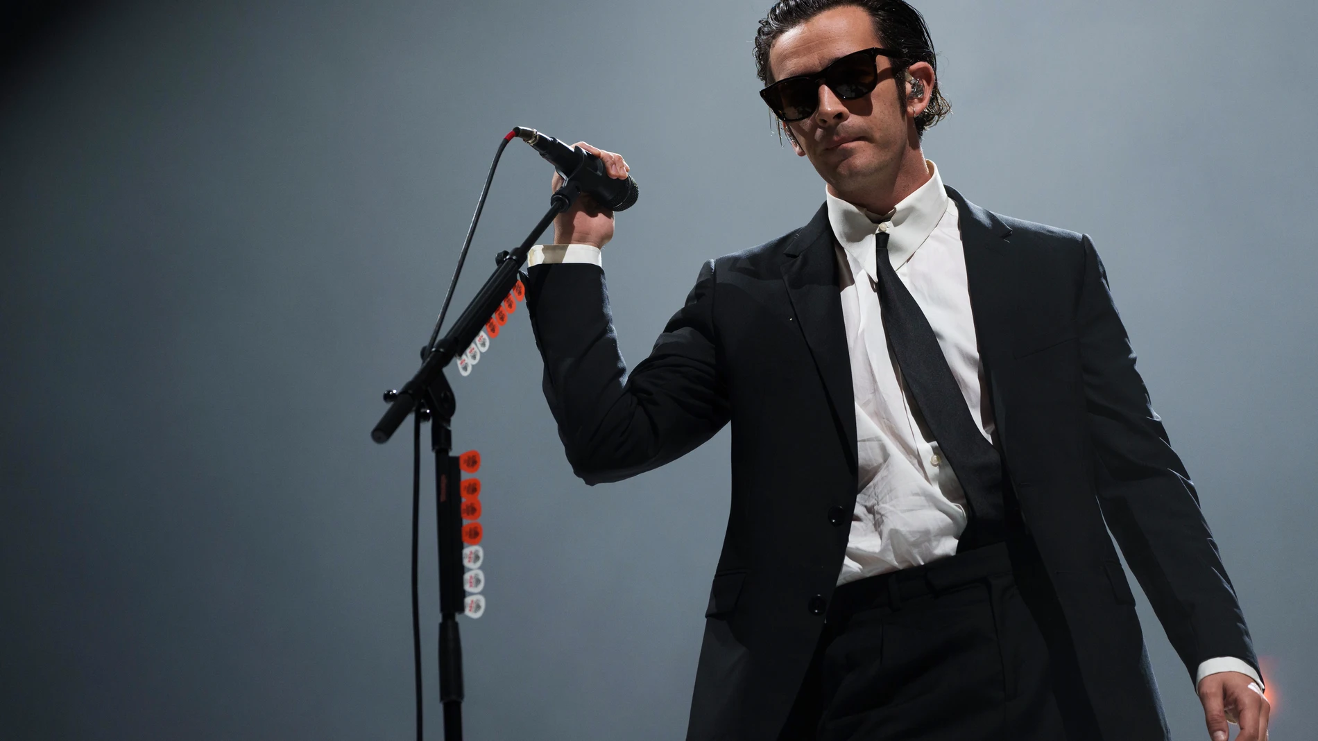 FILE - Matty Healy of the 1975 performs at the Reading Music Festival, England, Sunday, Aug. 28, 2022. Malaysia’s government has cut short a music festival after the lead singer of British band The 1975 slammed the country’s anti-gay laws and kissed a male bandmate during their performance. Malaysia's communications and digital minister has slammed Matty Healy’s conduct late Friday, July 21, 2023 at the start of the Good Vibes Festival as “very rude.” (Photo by Scott Garfitt/Invision/AP, file)
