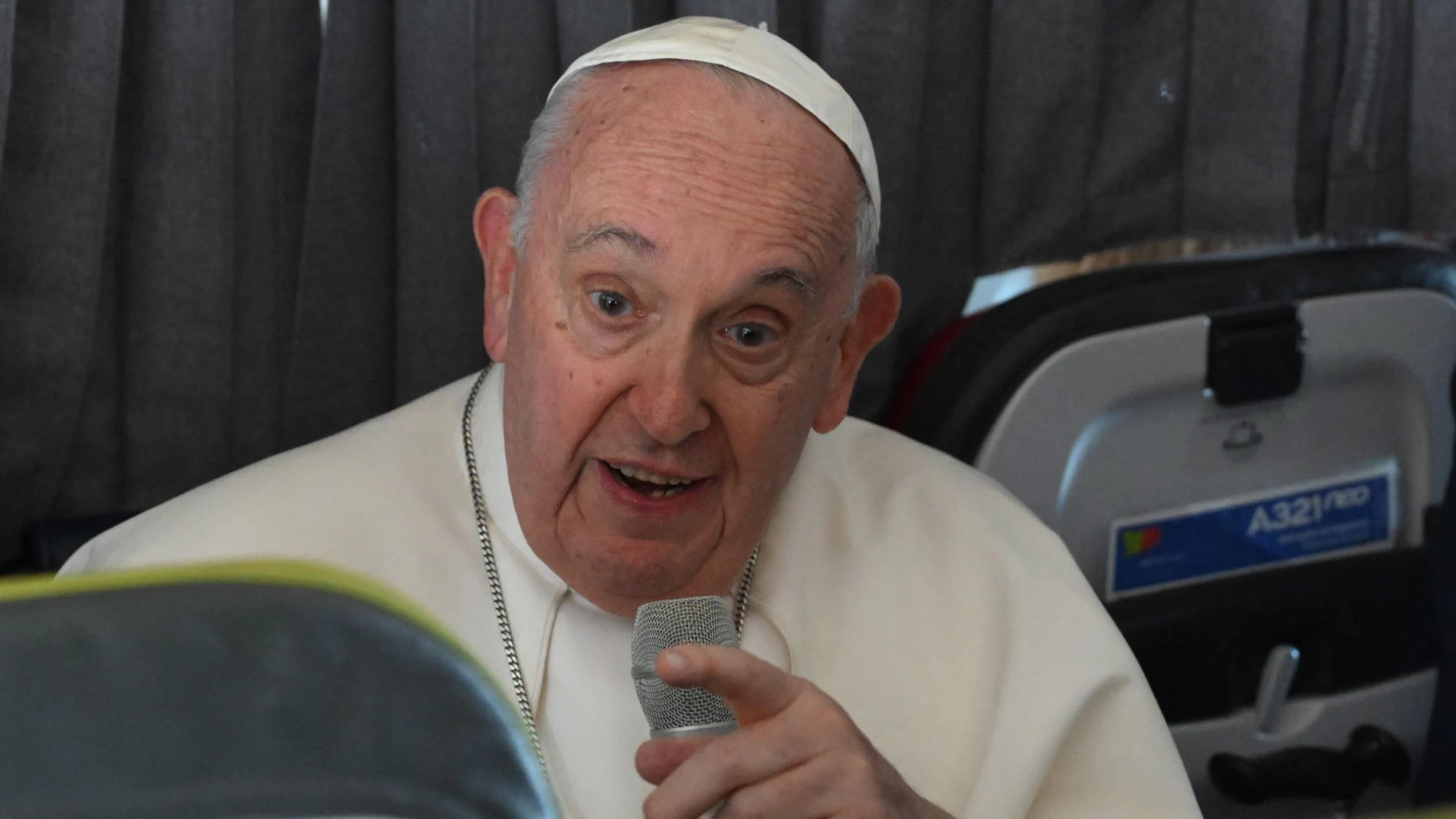 Pope Francis speaks with journalists during a press conference aboard the papal airplane heading to Rome, at the end of the 37th World Youth Day in Lisbon, Portugal, 06 August 2023.