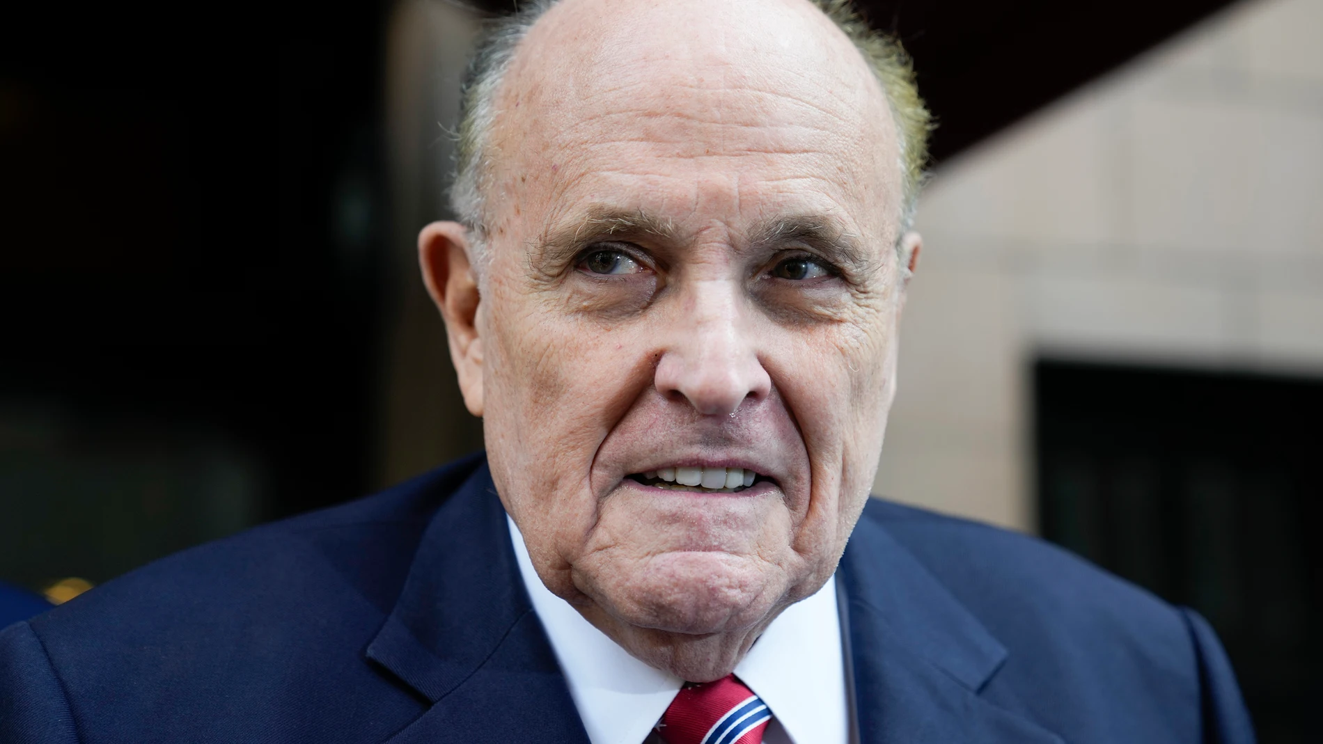 Former Mayor of New York Rudy Giuliani speaks to reporters as he leaves his apartment building in New York, Wednesday, Aug. 23, 2023. (AP Photo/Seth Wenig)
