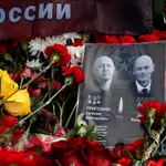 People visit an informal memorial in remembrance of Wagner chief in Russia